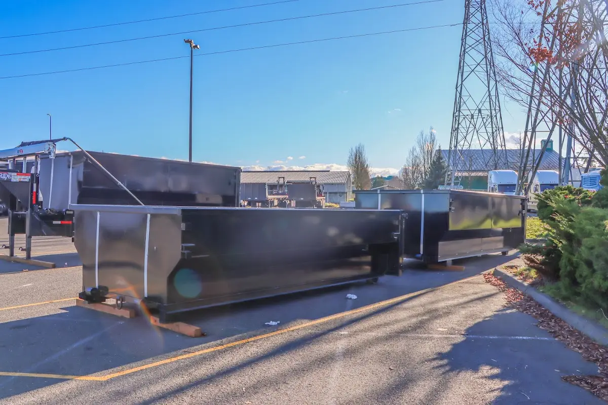 Roll-off dumpster ready for waste disposal at job site for Construction Dumpster Rental in Fort Scott